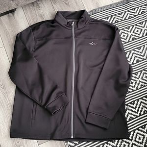 Men's Greg Norman black zip up jacket.